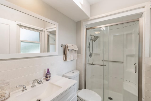 639 N Stephen Dr, Palatine, IL 60067 - full bath featuring tile walls, a stall shower, vanity, and wainscoting