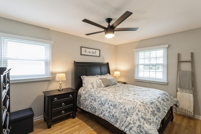 639 N Stephen Dr, Palatine, IL 60067 - bedroom with light wood-style flooring and a ceiling fan