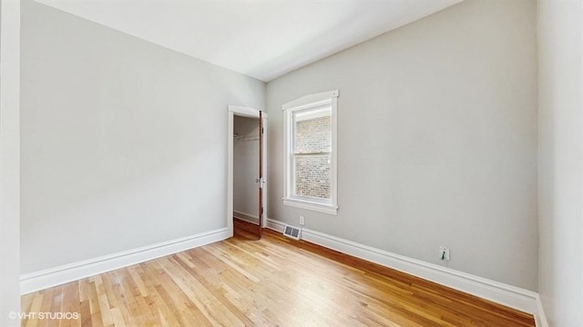 5041 W Fletcher St, Chicago, IL 60641 - spare room featuring light wood finished floors
