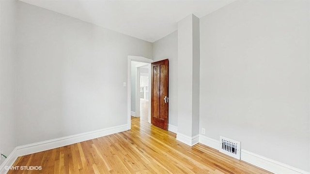 5041 W Fletcher St, Chicago, IL 60641 - unfurnished room featuring light wood-style flooring and baseboards