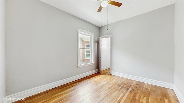5041 W Fletcher St, Chicago, IL 60641 - unfurnished room with light wood-style floors and a ceiling fan