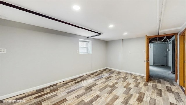 5041 W Fletcher St, Chicago, IL 60641 - below grade area featuring light wood-style floors and recessed lighting