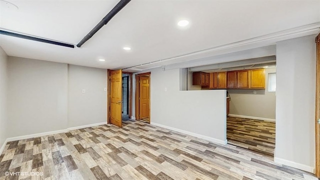 5041 W Fletcher St, Chicago, IL 60641 - finished below grade area featuring light wood-style floors and recessed lighting