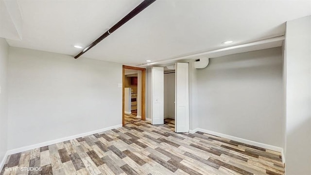 5041 W Fletcher St, Chicago, IL 60641 - finished below grade area with light wood-style floors and recessed lighting