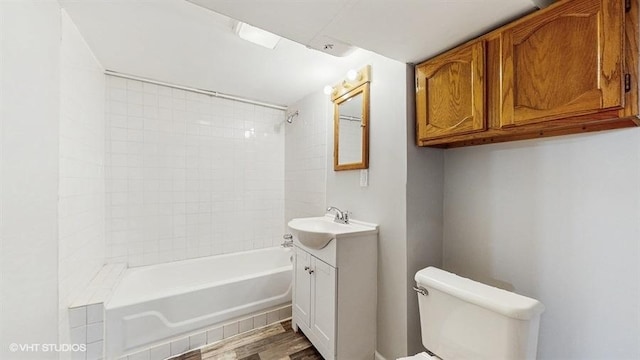 5041 W Fletcher St, Chicago, IL 60641 - bathroom with vanity, bathtub / shower combination, and wood finished floors