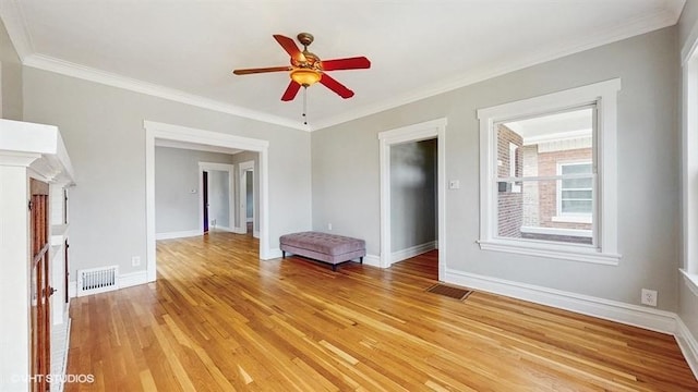 5041 W Fletcher St, Chicago, IL 60641 - unfurnished living room with a ceiling fan, light wood-style floors, and crown molding