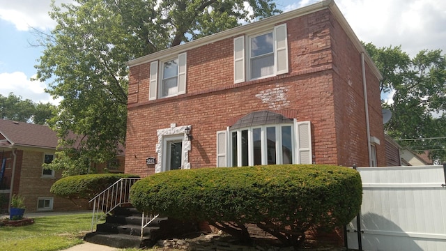 3512 W 84th St, Chicago, IL 60652 - colonial-style house featuring brick siding