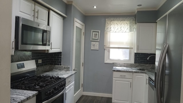 3512 W 84th St, Chicago, IL 60652 - kitchen featuring stainless steel appliances, ornamental molding, white cabinetry, decorative backsplash, and light stone countertops