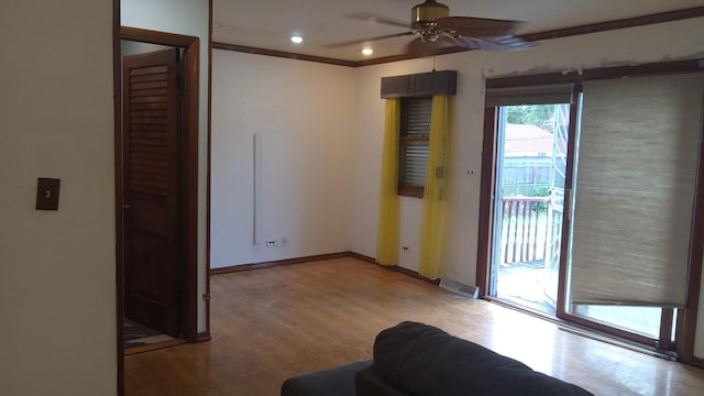 3512 W 84th St, Chicago, IL 60652 - doorway to outside featuring a ceiling fan and wood finished floors
