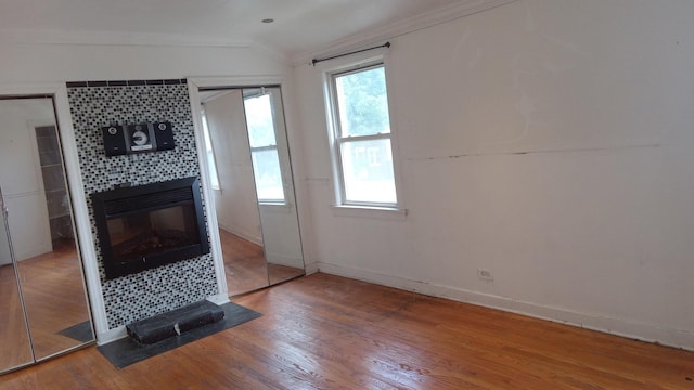 3512 W 84th St, Chicago, IL 60652 - unfurnished living room with a tile fireplace, crown molding, and wood finished floors