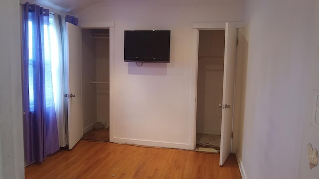 3512 W 84th St, Chicago, IL 60652 - unfurnished bedroom with light wood finished floors and lofted ceiling