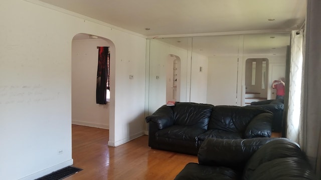 3512 W 84th St, Chicago, IL 60652 - living area with arched walkways and wood finished floors