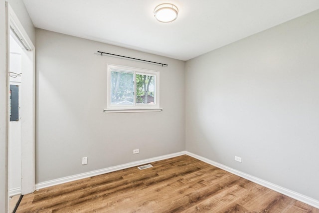 404 Virginia Pl, Wheeling, IL 60090 - empty room featuring wood finished floors and baseboards