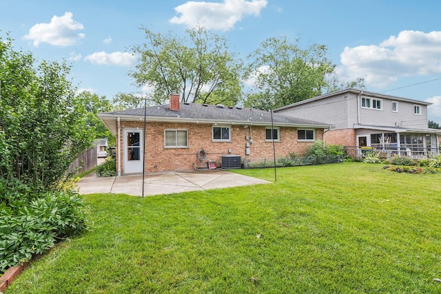 404 Virginia Pl, Wheeling, IL 60090 - back of house featuring a patio, brick siding, and a chimney