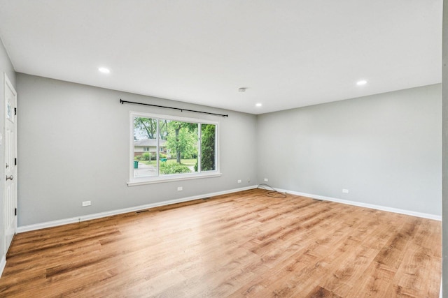 404 Virginia Pl, Wheeling, IL 60090 - spare room featuring light wood-style flooring and recessed lighting