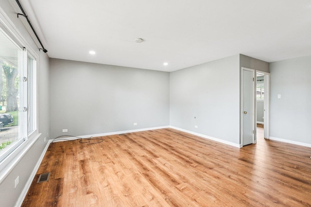 404 Virginia Pl, Wheeling, IL 60090 - spare room with light wood-type flooring and recessed lighting