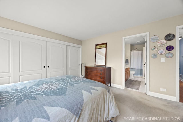 1675 Grosvenor Cir Unit D, Wheaton, IL 60189 - bedroom with carpet, a closet, and connected bathroom