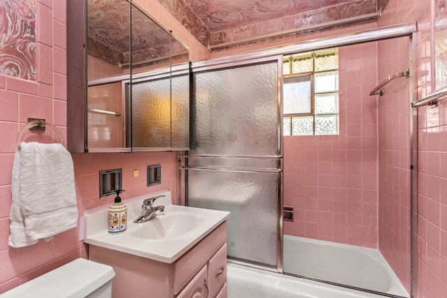 5128 Suffield Ct, Skokie, IL 60077 - bathroom featuring vanity and enclosed tub / shower combo