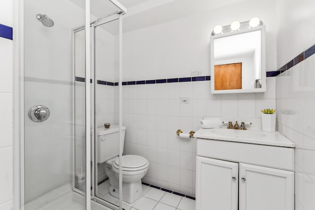 5128 Suffield Ct, Skokie, IL 60077 - full bathroom featuring tile walls, a stall shower, vanity, and tile patterned flooring