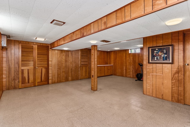 5128 Suffield Ct, Skokie, IL 60077 - below grade area featuring wood walls and light flooring