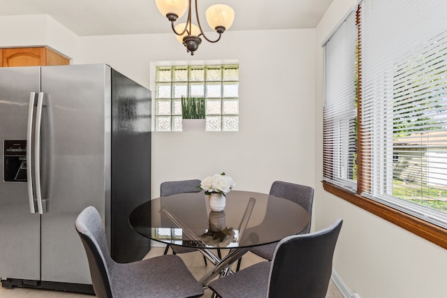 5128 Suffield Ct, Skokie, IL 60077 - dining area with a chandelier and baseboards