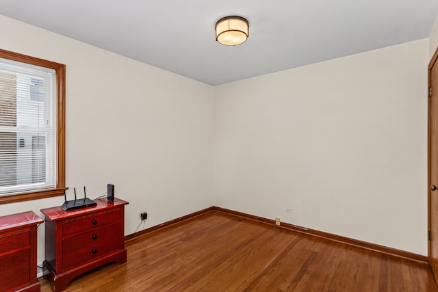 5128 Suffield Ct, Skokie, IL 60077 - unfurnished room with wood finished floors and an office area