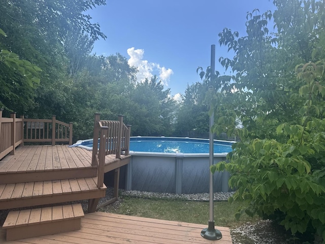 724 Cimarron Dr, Cary, IL 60013 - deck with an outdoor pool