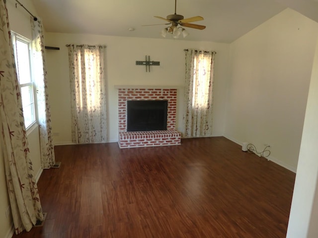1010 Trillium Ln, Bartlett, IL 60103 - unfurnished living room with wood finished floors, ceiling fan, a fireplace, and lofted ceiling