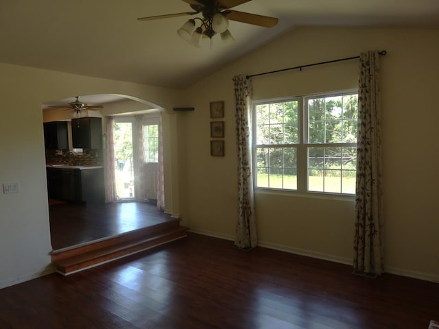1010 Trillium Ln, Bartlett, IL 60103 - empty room featuring a ceiling fan, plenty of natural light, arched walkways, wood finished floors, and lofted ceiling