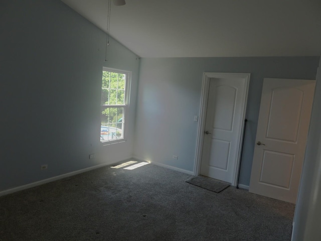 1010 Trillium Ln, Bartlett, IL 60103 - unfurnished bedroom featuring vaulted ceiling and carpet