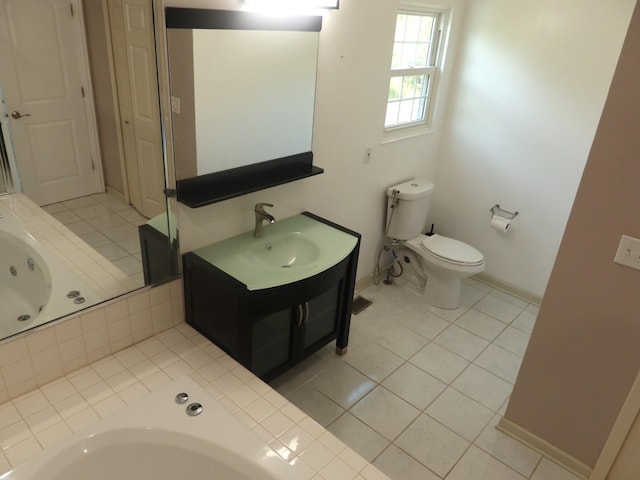 1010 Trillium Ln, Bartlett, IL 60103 - full bath featuring a jetted tub, tile patterned floors, and vanity
