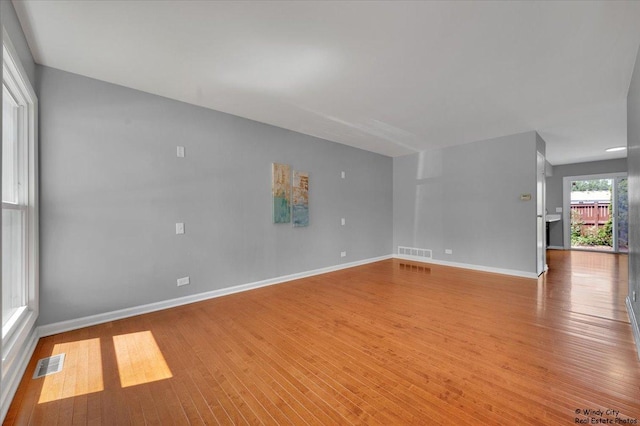 1718 Ardwick Dr, Hoffman Estates, IL 60169 - spare room with wood finished floors and baseboards