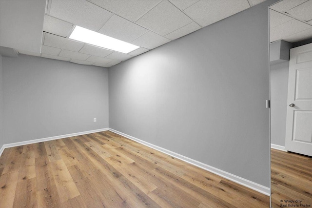 1718 Ardwick Dr, Hoffman Estates, IL 60169 - empty room featuring a paneled ceiling and light wood-type flooring