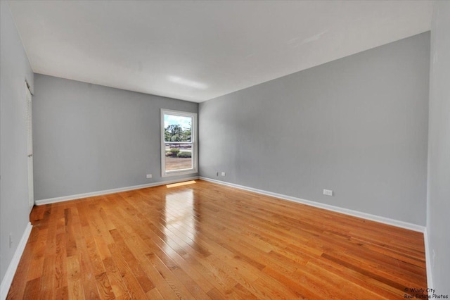1718 Ardwick Dr, Hoffman Estates, IL 60169 - unfurnished room featuring light wood-style floors and baseboards