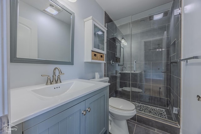 2123 Mallard Ln, Hanover Park, IL 60133 - full bathroom featuring a stall shower, vanity, and tile patterned floors