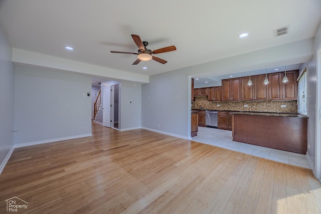 2123 Mallard Ln, Hanover Park, IL 60133 - unfurnished living room featuring a ceiling fan, stairs, light wood-style floors, and recessed lighting