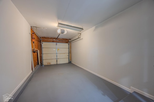 2123 Mallard Ln, Hanover Park, IL 60133 - garage featuring a garage door opener and baseboards