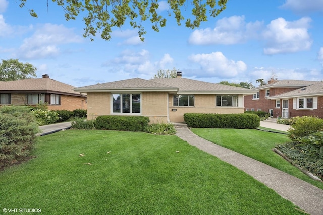 2555 Stratford Ave, Westchester, IL 60154 - ranch-style house featuring brick siding, a front lawn, and a chimney