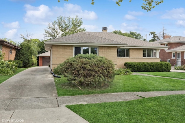 2555 Stratford Ave, Westchester, IL 60154 - view of front of house with brick siding, a front lawn, a chimney, and a shingled roof