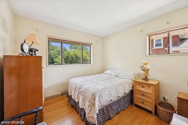 2555 Stratford Ave, Westchester, IL 60154 - bedroom featuring light wood-style floors