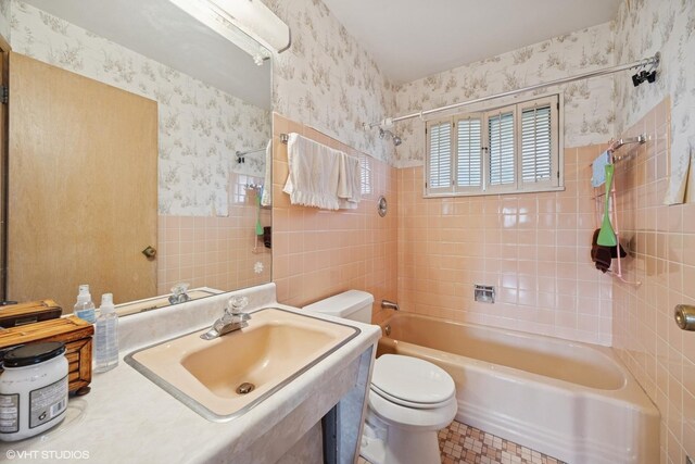 2555 Stratford Ave, Westchester, IL 60154 - full bathroom featuring shower / tub combination, wallpapered walls, and vanity
