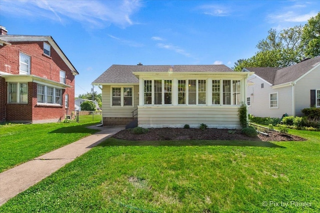 1020 S 4th St, Saint Charles, IL 60174 - view of front of home with a front lawn and a sunroom