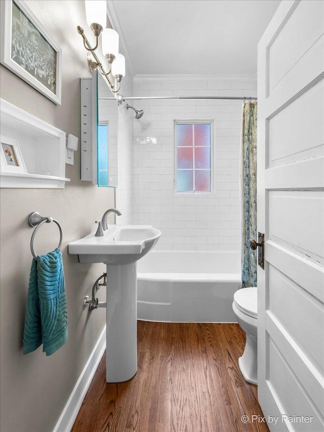 1020 S 4th St, Saint Charles, IL 60174 - full bathroom featuring ornamental molding, wood finished floors, and shower / bath combination with curtain