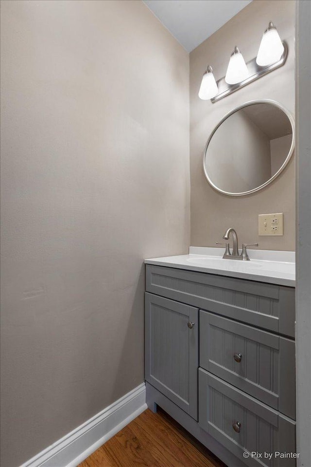 1020 S 4th St, Saint Charles, IL 60174 - bathroom featuring vanity and wood finished floors