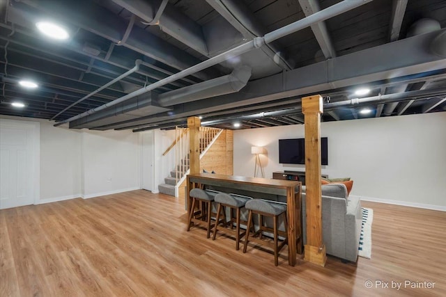 1020 S 4th St, Saint Charles, IL 60174 - finished below grade area featuring stairs and wood finished floors