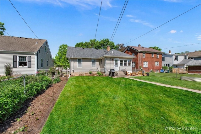 1020 S 4th St, Saint Charles, IL 60174 - back of house featuring a fenced backyard and entry steps