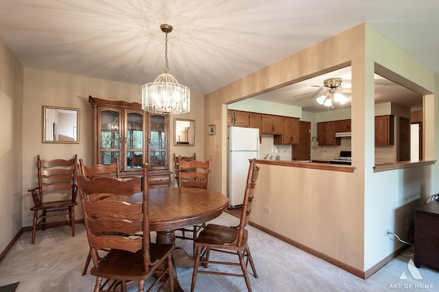11015 New Mexico Ct, Orland Park, IL 60467 - dining room with light colored carpet, a chandelier, and ceiling fan