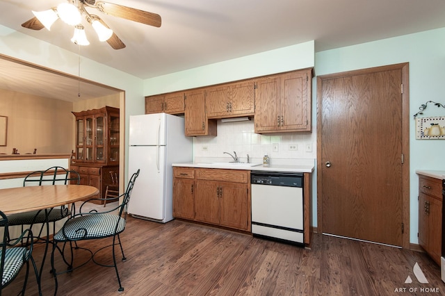 11015 New Mexico Ct, Orland Park, IL 60467 - kitchen with white appliances, light countertops, ceiling fan, and dark wood-type flooring