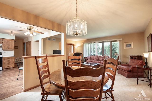 11015 New Mexico Ct, Orland Park, IL 60467 - dining room featuring a chandelier and ceiling fan