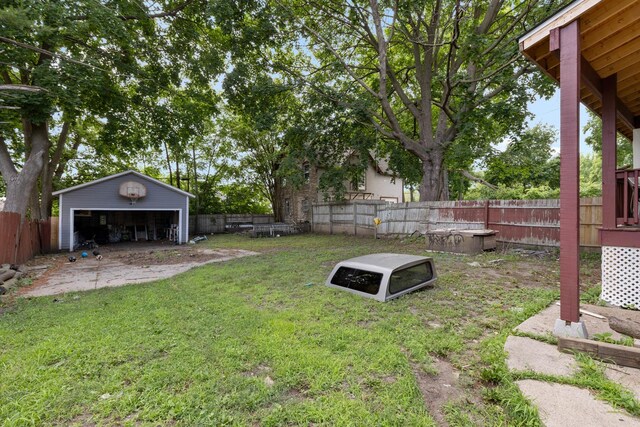 844 Haskell Ave, Rockford, IL 61103 - fenced backyard with a detached garage and an outdoor structure